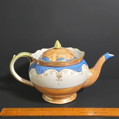 LOT 45: Porcelain Teapot with Basketweave Design and Japanese Lustreware Teapot and Creamer