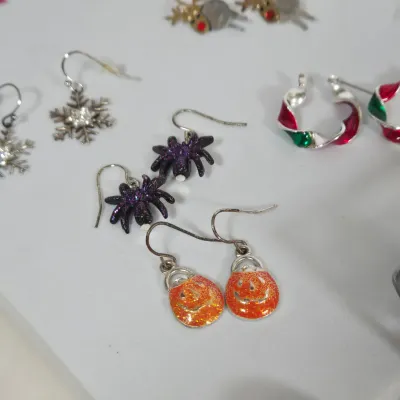 LOT 99: Fun, Holiday Earrings, Pins, and More