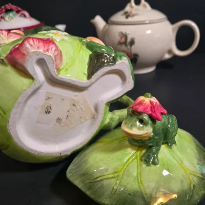 LOT 47: Whimsical Frog Teapot, Harry and David Limited Edition White W/ Raised Red Roses Floral Ceramic Teapot, and Ceramic Teapot from...