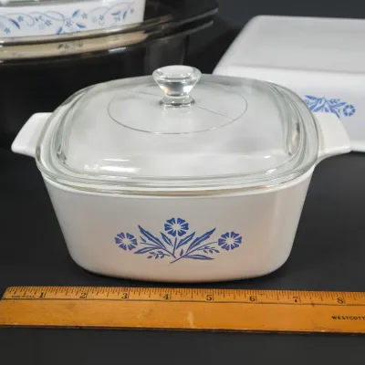 LOT 96: Vintage Corning Ware Blue Cornflower Covered Casserole Dishes & Square Baking Pan, Provincial Blue Square Casserole Dish, and...