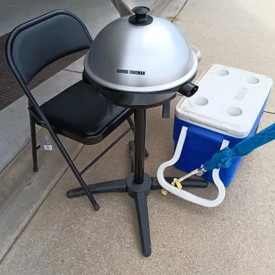 LOT 60: Coleman 40qt Wheeled Cooler, George Forman Electric Grill, Folding Chairs & Mini Chair Umbrella