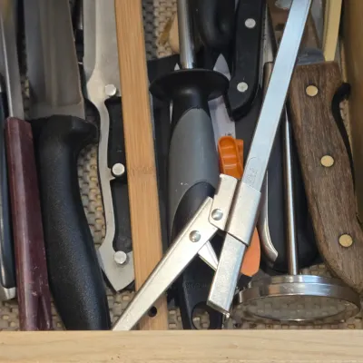 LOT 86: Multiple Kitchen Drawers Lot Including Flatware, Utensils, and More