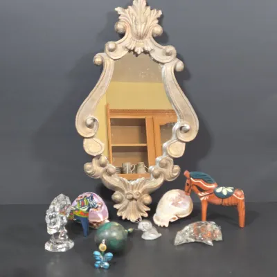 LOT 85: Ornate Wall Mirror, Handmade Hanging Ornament, Clear Glass Dragon & Turtle, Miniature Ceramic Dog, 2 Traditional Wooden Dala...