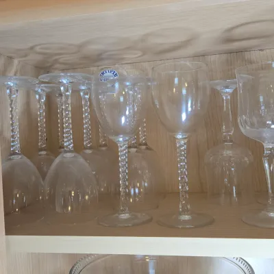 LOT 101: Kitchen Cabinet Lot Including Wine Glasses, Trifle Bowl, and More