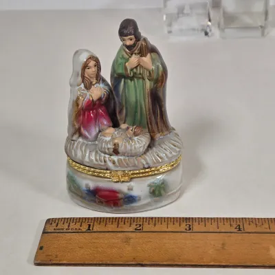 LOT 100: Porcelain Trinket Boxes, Two Clear, Geometric Cut Glass Paperweights, and More
