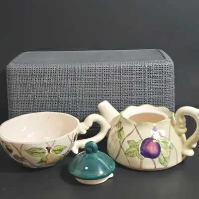 LOT 36: Collection of Four Ceramic Stackable "Tea for One" Teapots and Cups Sets
