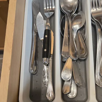 LOT 86: Multiple Kitchen Drawers Lot Including Flatware, Utensils, and More