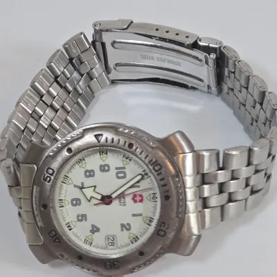 LOT 98: Vintage Stainless Steel Victorinox Swiss Army Quartz Wristwatch and Wrangler Quartz Wristwatch