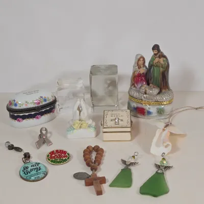 LOT 100: Porcelain Trinket Boxes, Two Clear, Geometric Cut Glass Paperweights, and More