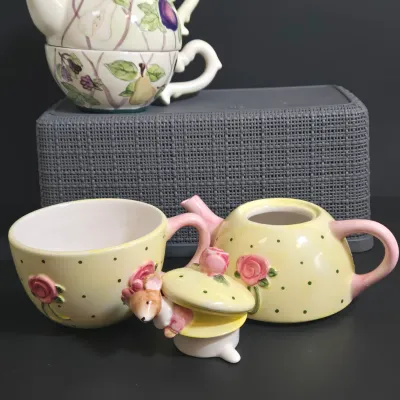 LOT 36: Collection of Four Ceramic Stackable "Tea for One" Teapots and Cups Sets