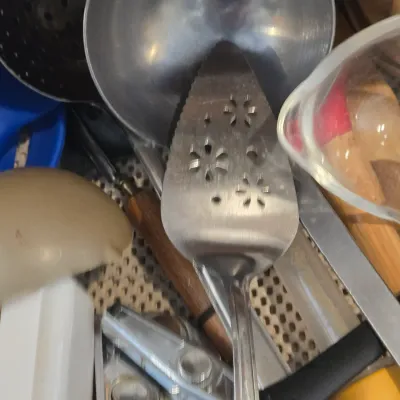 LOT 86: Multiple Kitchen Drawers Lot Including Flatware, Utensils, and More