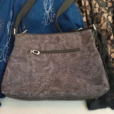 LOT 123: Sakroots Purse with Women's Dresses and Fashion Tops Sizes Large, 12 & 14