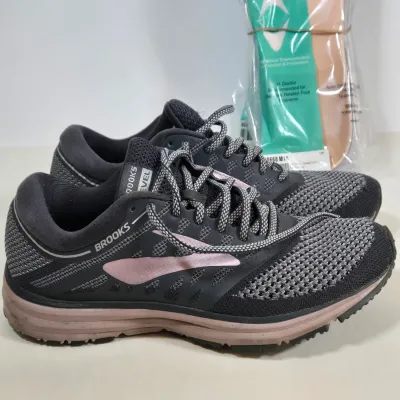 LOT 108: Brooks Women's Revel 'Grey Rose Gold' Running Shoes, Multiple Packs of Apex Shoe Inserts. and Shoe Horn