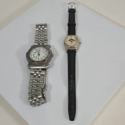 LOT 98: Vintage Stainless Steel Victorinox Swiss Army Quartz Wristwatch and Wrangler Quartz Wristwatch