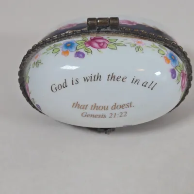 LOT 100: Porcelain Trinket Boxes, Two Clear, Geometric Cut Glass Paperweights, and More