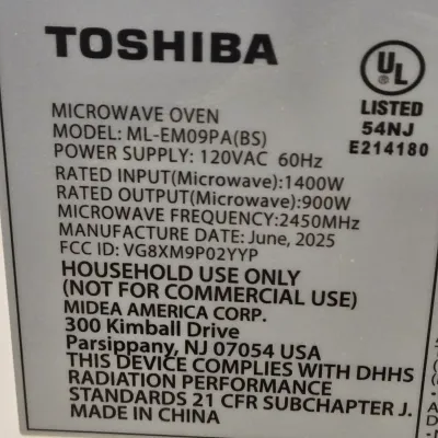 LOT 94: Toshiba Countertop Microwave Oven with a Stainless Steel Finish