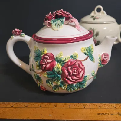 LOT 47: Whimsical Frog Teapot, Harry and David Limited Edition White W/ Raised Red Roses Floral Ceramic Teapot, and Ceramic Teapot from...