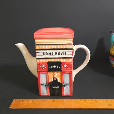 LOT 41: Vintage Novelty Teapot by MSRF Inc. Design Studio and Dogzilla Hand-Painted Ceramic Stackable Teapot and Cup Set