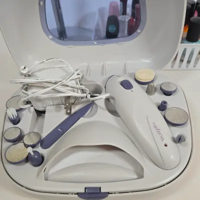 LOT 106: Manicure Kit, Nail Drills, Polishes, Makeup Brushes, Magnifying Mirror, and More