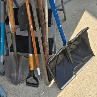LOT 57: Garage Finds/ Step Ladders, Rakes, Shovels, Sprinklers, and More