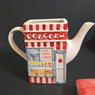 LOT 41: Vintage Novelty Teapot by MSRF Inc. Design Studio and Dogzilla Hand-Painted Ceramic Stackable Teapot and Cup Set