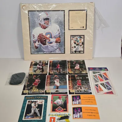 LOT 104: Limited Edition Dan Marino "Back in Stride" Sports Collectible Matted Collage, Oversized Collector Cards from the...