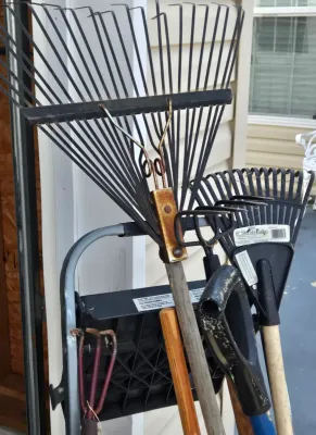 LOT 57: Garage Finds/ Step Ladders, Rakes, Shovels, Sprinklers, and More