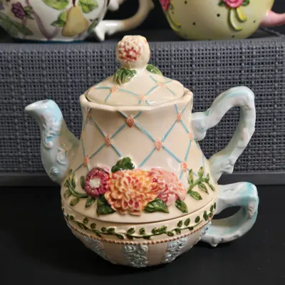 LOT 36: Collection of Four Ceramic Stackable "Tea for One" Teapots and Cups Sets