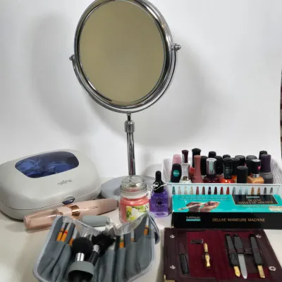LOT 106: Manicure Kit, Nail Drills, Polishes, Makeup Brushes, Magnifying Mirror, and More