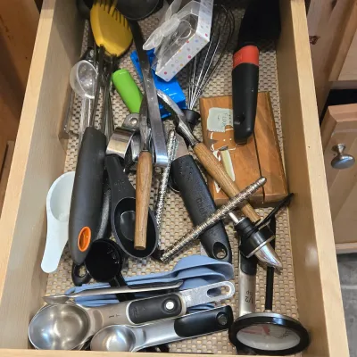 LOT 86: Multiple Kitchen Drawers Lot Including Flatware, Utensils, and More