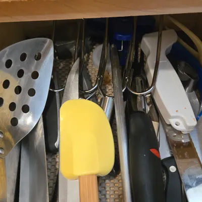 LOT 86: Multiple Kitchen Drawers Lot Including Flatware, Utensils, and More