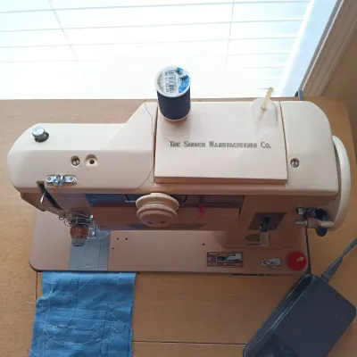 LOT 16: Singer Slant-O-Matic 401A Sewing Machine in Table with Bench & Crafting Accessories