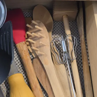 LOT 86: Multiple Kitchen Drawers Lot Including Flatware, Utensils, and More