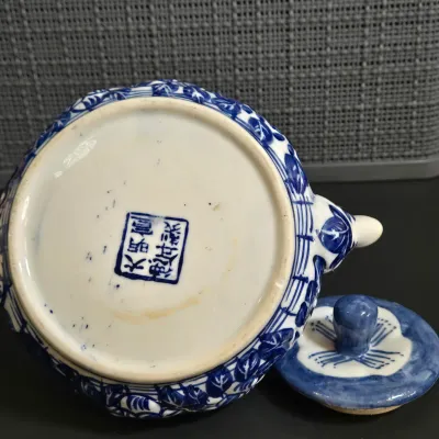 LOT 42: Vintage Blue and White Chinese Teapot and Japanese " Thousand Faces" Porcelain Tea Set