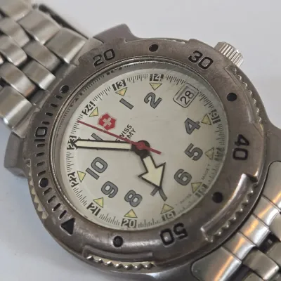 LOT 98: Vintage Stainless Steel Victorinox Swiss Army Quartz Wristwatch and Wrangler Quartz Wristwatch