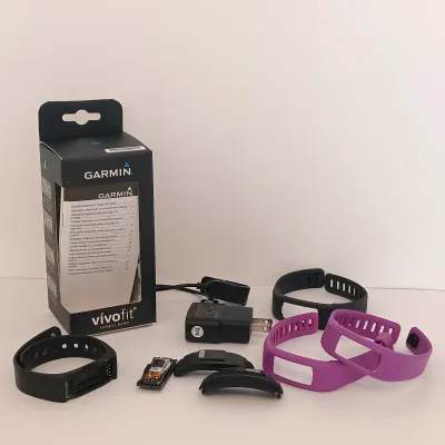 LOT 115: For Parts - Garmin VivoFit 4 Smart Watch & More