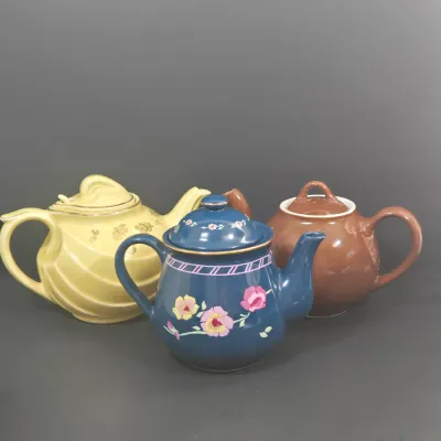 LOT 49: Vintage Sarma Studios Teapot and 2 Hall China Teapots