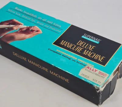 LOT 106: Manicure Kit, Nail Drills, Polishes, Makeup Brushes, Magnifying Mirror, and More