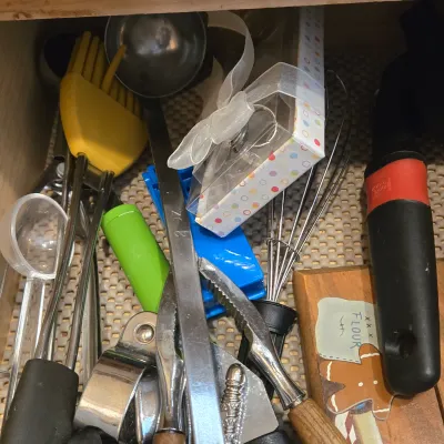 LOT 86: Multiple Kitchen Drawers Lot Including Flatware, Utensils, and More