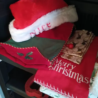 LOT 17: Large Collection of Winter / Christmas Decor - Throw Blankets, Decorative Mini Trees & Home Decor (cabinet NOT included)