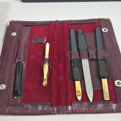 LOT 106: Manicure Kit, Nail Drills, Polishes, Makeup Brushes, Magnifying Mirror, and More