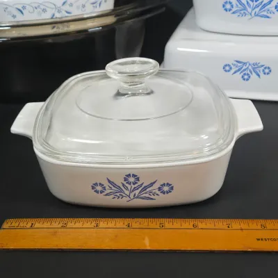 LOT 96: Vintage Corning Ware Blue Cornflower Covered Casserole Dishes & Square Baking Pan, Provincial Blue Square Casserole Dish, and...