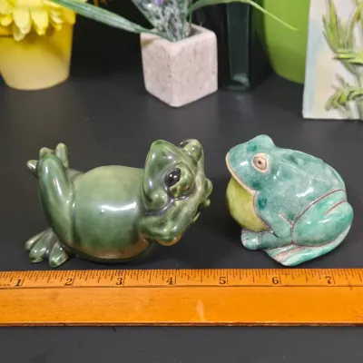 LOT 91: Faux Flower Decor, Vintage Clear and Frosted Leaf-shaped Decorative Bowl, Ceramic Frog Figurines, and More