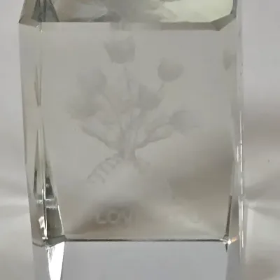 LOT 100: Porcelain Trinket Boxes, Two Clear, Geometric Cut Glass Paperweights, and More