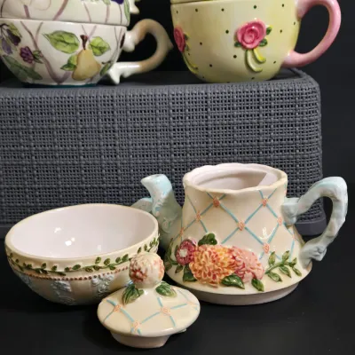 LOT 36: Collection of Four Ceramic Stackable "Tea for One" Teapots and Cups Sets
