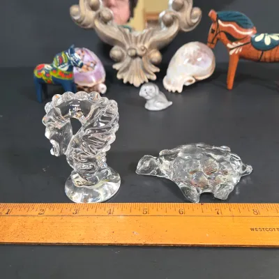 LOT 85: Ornate Wall Mirror, Handmade Hanging Ornament, Clear Glass Dragon & Turtle, Miniature Ceramic Dog, 2 Traditional Wooden Dala...