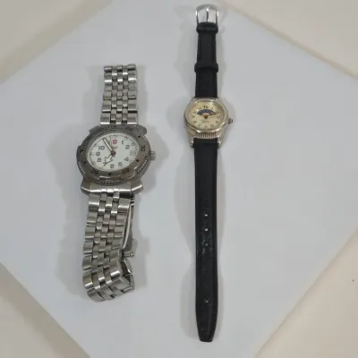 LOT 98: Vintage Stainless Steel Victorinox Swiss Army Quartz Wristwatch and Wrangler Quartz Wristwatch