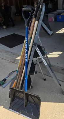 LOT 57: Garage Finds/ Step Ladders, Rakes, Shovels, Sprinklers, and More