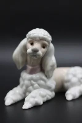 Lladró Reclining Poodle with Pink Bow Porcelain Figurine