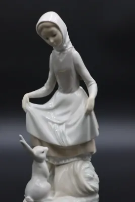 Lladró Rabbit’s Food Girl with Bunny Porcelain Figurine